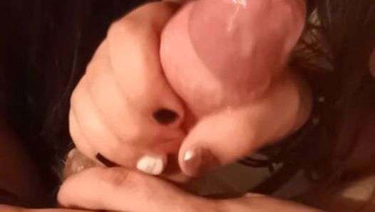 She takes off the condom and makes me cum by sucking