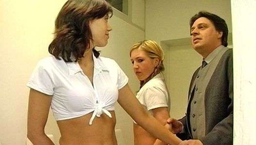 Two school friends are punished by their teacher after class