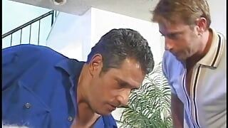 Blond porn-star taking two dicks