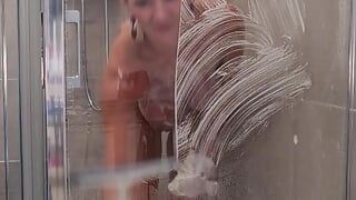 MILF taking butt plug into her ass and then taking a shower