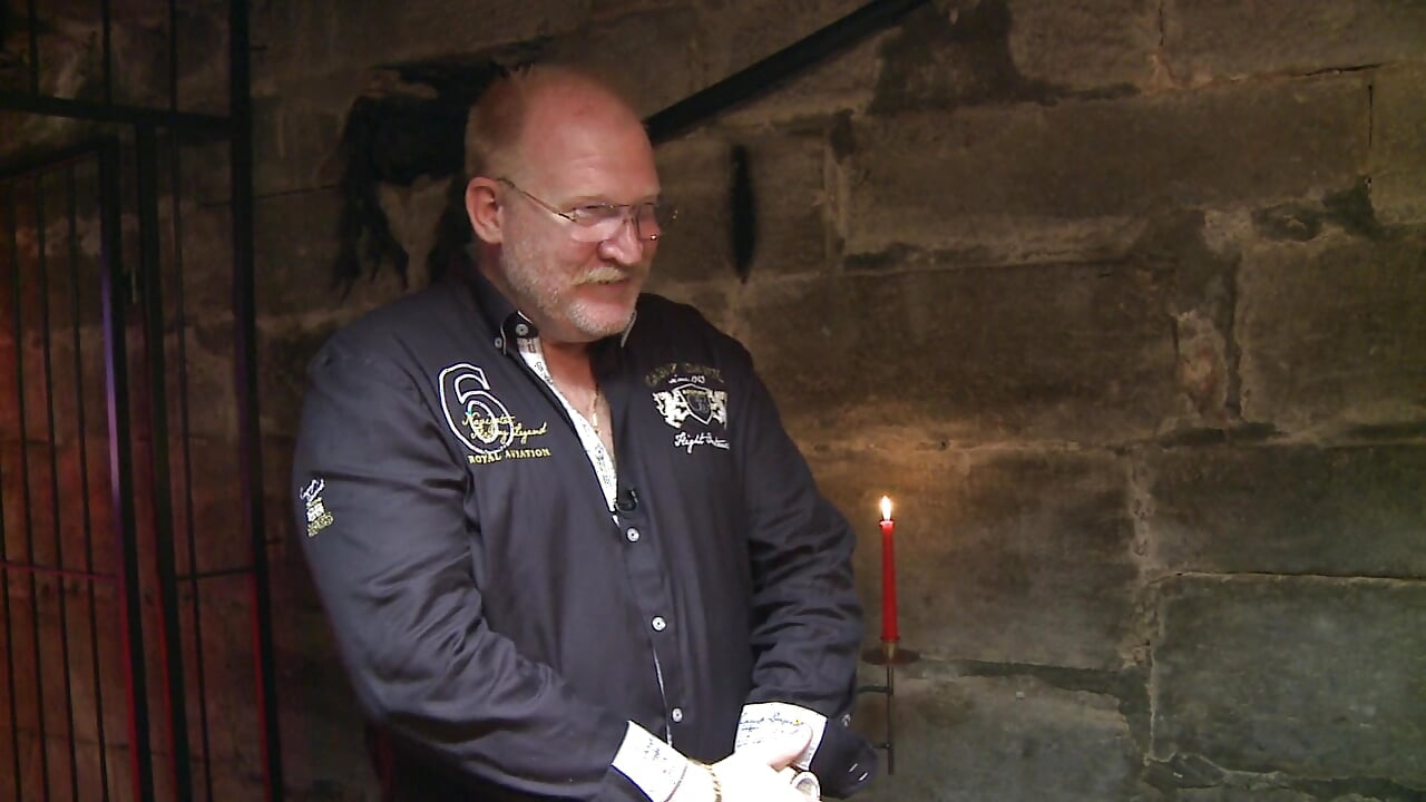 An old lady with a slim body gets her shaved pussy fisted