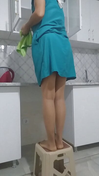 Turkish cleaning woman in hijab natural