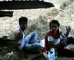 Indian Girl allow to play her lover with her Boobs in a Park