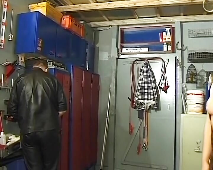 Mature German slut dominated by her master in the workshop