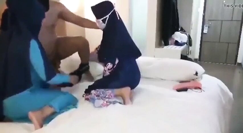 threesome with two Hijab Women